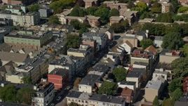 5.5K aerial stock footage flying by row houses, streets, South Boston, Massachusetts Aerial Stock Footage | AX142_229