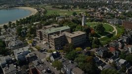 5.5K aerial stock footage of South Boston Education Complex, tilt down, South Boston, Massachusetts Aerial Stock Footage | AX142_241E