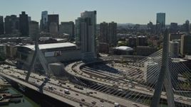 5.5K aerial stock footage flying by the Zakim Bridge and TD Garden, Boston, Massachusetts Aerial Stock Footage | AX142_299E