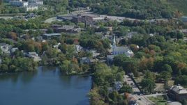 5.5K aerial stock footage flying by small town with waterfront homes in autumn, Braintree, Massachusetts Aerial Stock Footage | AX143_008