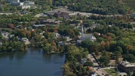 5.5K aerial stock footage flying by small town with waterfront homes in autumn, Braintree, Massachusetts Aerial Stock Footage | AX143_008E