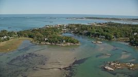 5.5K aerial stock footage fly over a small town by a lake, approach upscale oceanfront homes, Cohasset, Massachusetts Aerial Stock Footage | AX143_026E