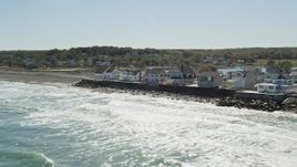 5.5K aerial stock footage flying by oceanfront homes, pan right, Scituate, Massachusetts Aerial Stock Footage | AX143_033
