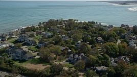 5.5K aerial stock footage flying by upscale oceanfront homes, Scituate, Massachusetts Aerial Stock Footage | AX143_044
