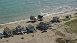 5.5K aerial stock footage flying by elevated oceanfront homes, Scituate, Massachusetts Aerial Stock Footage | AX143_045