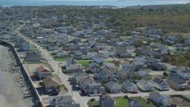 5.5K aerial stock footage flying over oceanfront homes, small coastal town, Marshfield, Massachusetts Aerial Stock Footage | AX143_058