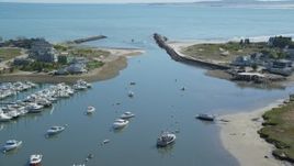 5.5K aerial stock footage of fishing boats, small town, approaching Cape Cod Bay, Marshfield, Massachusetts Aerial Stock Footage | AX143_062