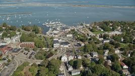5.5K aerial stock footage flying by small coastal town, Plymouth Harbor, Plymouth, Massachusetts Aerial Stock Footage | AX143_094E