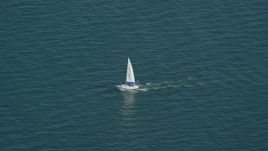 5.5K aerial stock footage tracking a sailing boat on Cape Cod Bay, Massachusetts Aerial Stock Footage | AX143_125