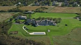 5.5K aerial stock footage orbiting a mansion, Cape Cod, Dennis, Massachusetts Aerial Stock Footage | AX143_159