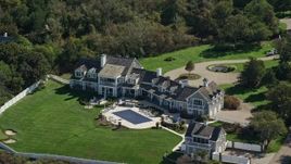 5.5K aerial stock footage orbiting mansion, green lawns, Cape Cod, Dennis, Massachusetts Aerial Stock Footage | AX143_166E