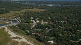 5.5K aerial stock footage approaching small coastal town and church, Cape Cod, Orleans, Massachusetts Aerial Stock Footage | AX143_178E