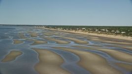5.5K aerial stock footage flying over sand bars, by beachfront homes, Eastham, Massachusetts Aerial Stock Footage | AX143_184