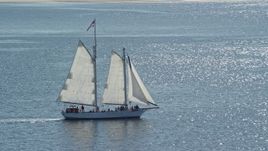 5.5K aerial stock footage tracking sailing boat on Cape Cod Bay, Massachusetts Aerial Stock Footage | AX143_243