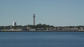 5.5K aerial stock footage orbiting sailing boat, revealing Pilgrim Monument and Provincetown, Massachusetts Aerial Stock Footage | AX143_244E