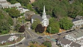 5.5K aerial stock footage flying by small town church, colorful trees, Cape Cod, Chatham, Massachusetts Aerial Stock Footage | AX144_051