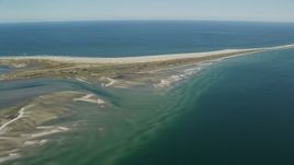5.5K aerial stock footage flying by sand bars at low tide and Monomoy Island, Massachusetts Aerial Stock Footage | AX144_058E