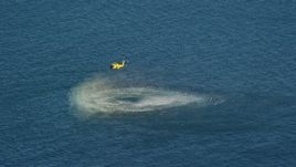 5.5K aerial stock footage flying by a Coast Guard helicopter conducting rescue practice, Atlantic Ocean Aerial Stock Footage | AX144_070