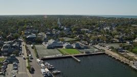 5.5K aerial stock footage approaching church in a small coastal town from over the water,  Nantucket, Massachusetts Aerial Stock Footage | AX144_082E