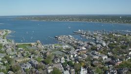 5.5K aerial stock footage orbiting small coastal town, Nantucket Harbor, Nantucket, Massachusetts Aerial Stock Footage | AX144_085