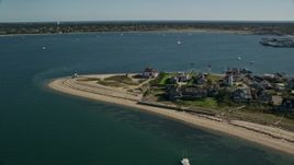 5.5K aerial stock footage flying by oceanfront homes, Nantucket Harbor Lights, Nantucket, Massachusetts Aerial Stock Footage | AX144_088E