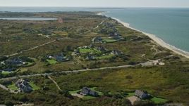 5.5K aerial stock footage flying over beachfront upscale homes, coastal community, Nantucket, Massachusetts Aerial Stock Footage | AX144_108E