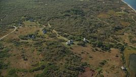5.5K aerial stock footage approaching, tilt down on homes, Tuckernuck Island, Nantucket, Massachusetts Aerial Stock Footage | AX144_118