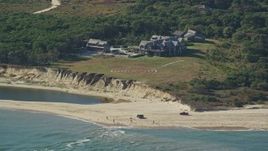 5.5K aerial stock footage of an isolated beachfront mansion, Chappaquiddick Island, Martha's Vineyard, Massachusetts Aerial Stock Footage | AX144_123E