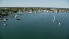 5.5K aerial stock footage flying over boats, small coastal town, Edgartown, Martha's Vineyard, Massachusetts Aerial Stock Footage | AX144_133E