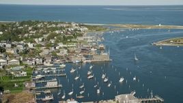 5.5K aerial stock footage orbiting small coastal town, piers, Edgartown, Martha's Vineyard, Massachusetts Aerial Stock Footage | AX144_139