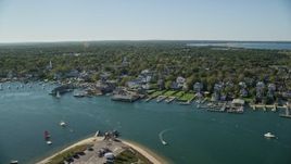 5.5K aerial stock footage orbiting small coastal town, piers, Edgartown, Martha's Vineyard, Massachusetts Aerial Stock Footage | AX144_141