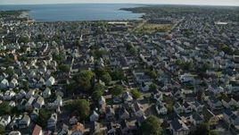 6k aerial stock footage flying by coastal community, New Bedford, Massachusetts Aerial Stock Footage | AX144_204