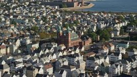 6k aerial stock footage flying by neighborhoods, Our Lady- Mt Carmel Church, New Bedford, Massachusetts Aerial Stock Footage | AX144_205