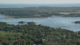 6k aerial stock footage flying by Apponagansett Bay, Dartmouth, Massachusetts Aerial Stock Footage | AX144_207E