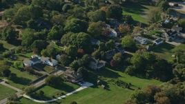 6k aerial stock footage flying by rural homes near a river, Little Compton, Rhode Island Aerial Stock Footage | AX144_217E