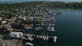 6k aerial stock footage of waterfront hotels, marina, coastal community, Newport, Rhode Island Aerial Stock Footage | AX144_239