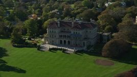 6k aerial stock footage flying by The Breakers, mansion, Newport, Rhode Island Aerial Stock Footage | AX144_257