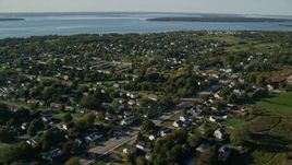 6k aerial stock footage flying by a coastal community, Middletown, Rhode Island Aerial Stock Footage | AX145_001E