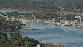 6k aerial stock footage flying by small coastal town, waterfront properties, sailboats, Warren, Rhode Island Aerial Stock Footage | AX145_016