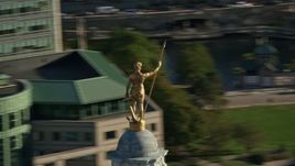 6k aerial stock footage orbiting gold statue atop the Rhode Island State House, Providence, Rhode Island Aerial Stock Footage | AX145_040