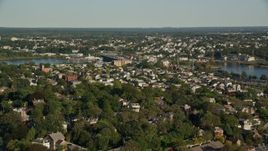 6k aerial stock footage flying by a residential neighborhood, pan left, Providence, Rhode Island Aerial Stock Footage | AX145_060