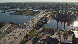 6k aerial stock footage approaching Providence River Bridge, power plant, smoke stacks, Providence, Rhode Island Aerial Stock Footage | AX145_080E