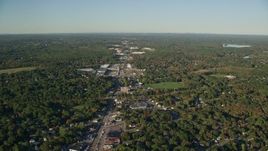 6k aerial stock footage flying over Washington Street, strip malls, autumn, Attleboro, Massachusetts Aerial Stock Footage | AX145_098