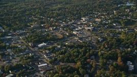 6k aerial stock footage flying by small town center, trees, autumn, North Attleborough, Massachusetts Aerial Stock Footage | AX145_103E