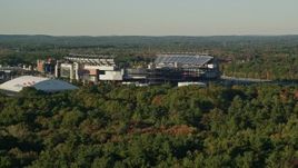 6k aerial stock footage flying low, approaching Gillette Stadium, autumn, Foxborough, Massachusetts Aerial Stock Footage | AX145_114E