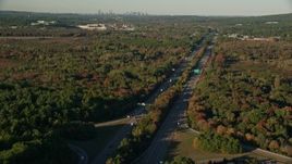 6k aerial stock footage flying by Interstate 95, colorful trees, autumn, Norwood, Massachusetts Aerial Stock Footage | AX145_128E