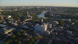 6k aerial stock footage flying by Harvard University, Cambridge, Massachusetts, sunset Aerial Stock Footage | AX146_022