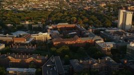 6k aerial stock footage approaching Harvard University buildings, Cambridge, Massachusetts, sunset Aerial Stock Footage | AX146_034