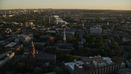 6k aerial stock footage flying by Harvard University, Cambridge, Massachusetts, sunset Aerial Stock Footage | AX146_035E