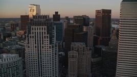6k aerial stock footage of One Financial Center, One Lincoln Street, Downtown Boston, Massachusetts, sunset Aerial Stock Footage | AX146_085